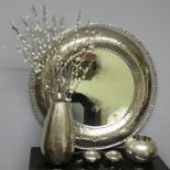 A round chromed mirror, matching vase and candleholders. Mirror 82 cm. Vase 37 cm high.