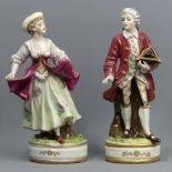 Antique pair of German porcelain figures, modelled as a courting couple. 20 cm. UK Postage £16.