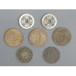 Seven Chinese coins. UK Postage £12.