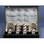 A cased Royal Crown Derby 1128 Imari porcelain cabinet cup and saucer set. Cups 82 mm to top of