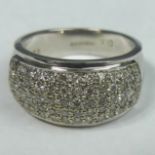 9 carat gold diamond Pave set ring (approx. 0.75ct), 7.8 grams. Size P, 11.5 mm top, band 5.5 mm. UK