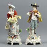 A pair of early 20th century Sitzendorf German porcelain figures. 19 cm. UK Postage £16.