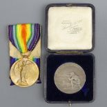 World War I Service medal 36557 P.T.E E. Foster S.Staff and a marksmanship medal 1918 awarded to T.