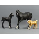 Beswick Black Beauty and foal and a Palomino foal. UK Postage £16.