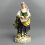 Samson Derby porcelain figure of a female musician, circa 1880. 25 cm high. UK Postage £20.