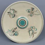 A large Poole Art Deco pottery Fruit and Flowers design footed plate, circa 1930. 33 cm diameter.