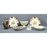 A pair of Royal Doulton pottery plates, a Staffordshire porcelain figural inkwell, a cream ware