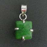 A Sterling silver and emerald pendant, 4.5 grams. 30 mm x 15 mm. UK Postage £12.