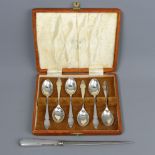 A cased set of George V silver teaspoons, Sheffield 1929 (80 grams) & a silver handled letter opener