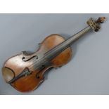 After Antonius Stradivarius a labelled violin. L.O.B. 36 cm. UK Postage £20.