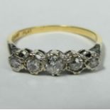 Vintage 18 carat gold and platinum five stone diamond ring. Size M 1/2, top 4.5 mm, band 1.4 mm. 2.4