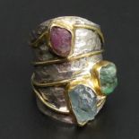 White and yellow metal Ruby, Emerald and Aquamarine ring, 13.7 grams. Size N, 30 mm long. UK Postage