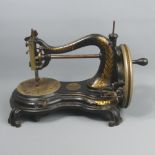 Jones hand crank 'Serpentine' sewing machine, circa 1890. 27 cm high. UK Postage £20.