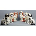 Three pairs of Staffordshire type pottery spaniel dog figures. 23 cm. UK Postage £20.