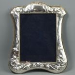Elizabeth II silver photograph frame, London 1983. 24.5 x 30 cm. Aperture 15 x 20 cm. UK Postage £