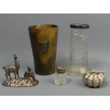 .950 standard silver Llama and figure, a silver rimmed vase, a silver topped perfume bottle, horn