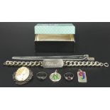 Sterling silver I.D. bracelet, two silver rings, a pendant, a cameo brooch along with two silver and