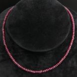 Sterling silver and Ruby bead 44 cm long necklace. 14.4 grams, beads 4.4 mm. UK Postage £12.