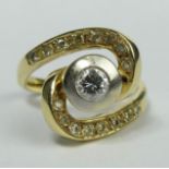 14 carat gold diamond set ring, centre stone approx. .33ct and 4.5 mm in diameter. Size L, 15.5 mm