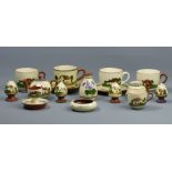 Torquay Devon Motto ware, including cruets and cups and saucers. Cups 8 cm. UK Postage £16.