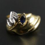 Stylish 18 carat gold Sapphire and Diamond ring, London 1996. 7 grams. Size P, Top 11.8 mm, Band 4