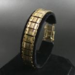 9 carat gold fancy link bracelet with safety chain, 12.8 grams. 19 cm long 11.6 mm wide. UK
