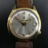 Bulova Accutron date adjust gold tone watch on a leather strap. 34 mm dia. UK Postage £12.