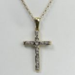 Large 9 carat gold stone set cross and chain, Sheffield 1998, 21.4 grams. Cross 6 cm, chain 50.5 cm.