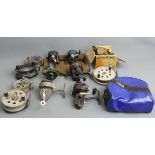 A collection of old fishing reels including Strike Right and ABU. UK Postage £18.