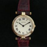 Cartier 18 carat tricolour gold quartz watch on a maroon leather strap. 25 mm wide (excluding the