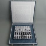 Swarovski silver crystal boxed chess set and board. 34 cm square. UK Postage £20.