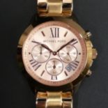 Michael Kors rose gold tone quartz date adjust MK-5778 watch. 40 mm dial excluding the button. UK
