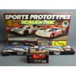 A boxed Scalextric set - Sports Prototypes, two bridges and a boxed Aston Martin. UK Postage £30.