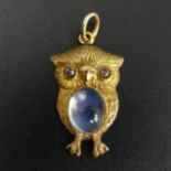 Charming 18 carat gold moonstone and ruby owl design pendant, 5.4 grams. 31 x 16 mm. UK Postage £12.