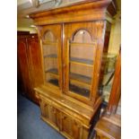 A VICTORIAN MAHOGANY GLAZED FLOORSTANDING BOOKCASE, the twin glazed door upper section with