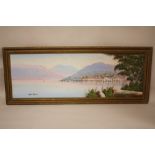 A GILT FRAMED OIL ON BOARD OF A HARBOUR SCENE AT SUNSET SIGNED PAOLO VANELLI, OVERALL SIZE INCLUDING
