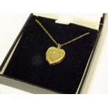 A 9CT BK & FT HEART SHAPED LOCKET