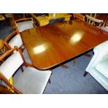 A 'BRIGHTS OF NETTLEBED' REPRODUCTION MAHOGANY TWIN PEDESTAL DINING TABLE WITH ONE ADDITIONAL LEAF