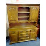 A SOLID OAK WELSH TYPE DRESSER H-199 W-156 CM