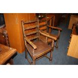 A PAIR OF CARVED OAK DINING CHAIRS WITH BARLEYTWIST SUPPORTS