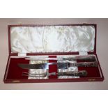 A CASED CARVING SET