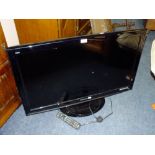 A PANASONIC 37" FLATSCREEN TV - REMOTE- H/C