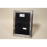 A HALLMARKED SILVER RECTANGULAR EASEL BACK PICTURE FRAME, OVERALL 20 X 15 CM