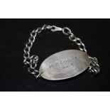 A WORLD WAR II SILVER ID BRACELET