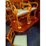 A YEW WOOD TWIN PEDESTAL DINING TABLE AND 6 CHAIRS