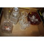 A BOX OF CUT GLASS TO INCLUDE DECANTERS, RED CUT GLASS BOWL