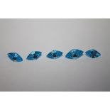 A COLLECTION OF SWISS BLUE TOPAZ STYLE STONES