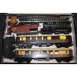 A TRI-ANG R350 MODEL RAILWAY LOCOMOTIVE TOGETHER WITH CARRIAGES ETC.