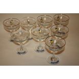 AN ASSORTED SET OF EIGHT BABYCHAM GLASSES