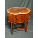 AN ANTIQUE AND LATER MAHOGANY INLAID OCTAGONAL BOX ON LEGS H-70 W-60 CM
